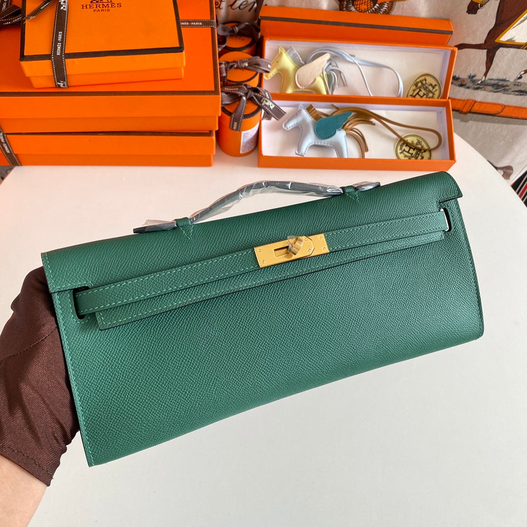 HERMES KELLY CUT 31 IN GREEN FOREST CALFSKIN WITH GOLD HARDWARE