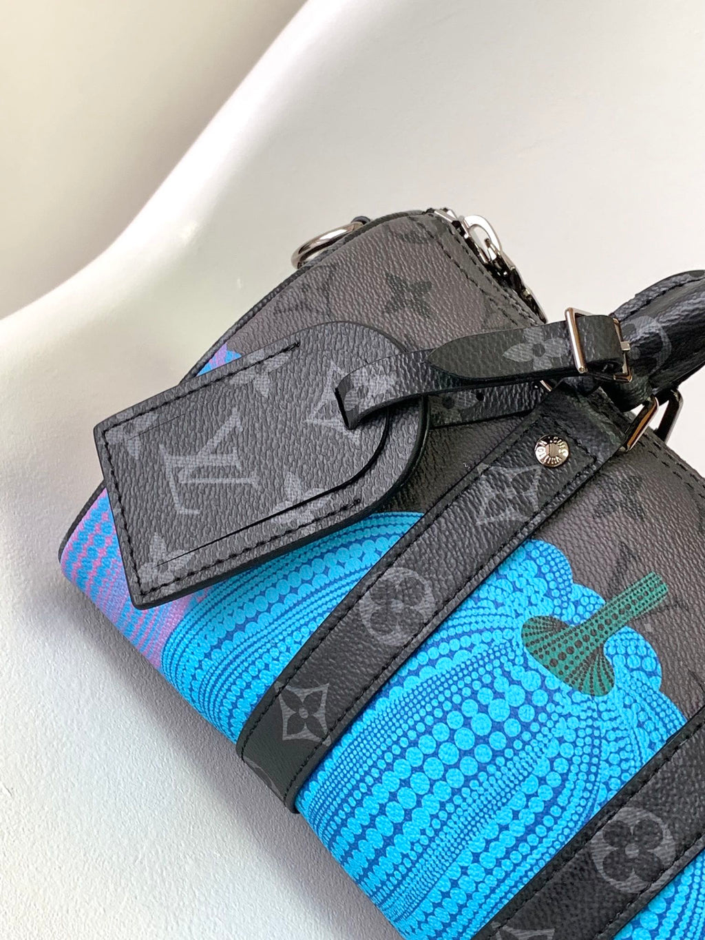 LOUIS VUITTON KEEPALL BANDOULIÈRE 21 IN MULTICOLOR CALFSKIN