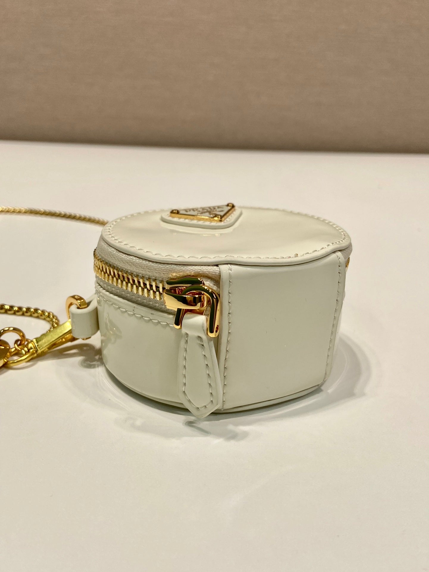 PRADA MINI ROUND BAG 8 IN WHITE GLOSSY CALFSKIN GOLD HARDWARE