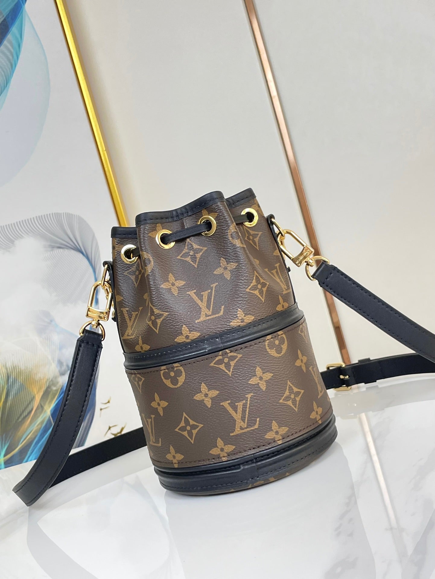 LOUIS VUITTON CANOÉ 20 IN BROWN MONOGRAM CANVAS GOLD HARDWARE