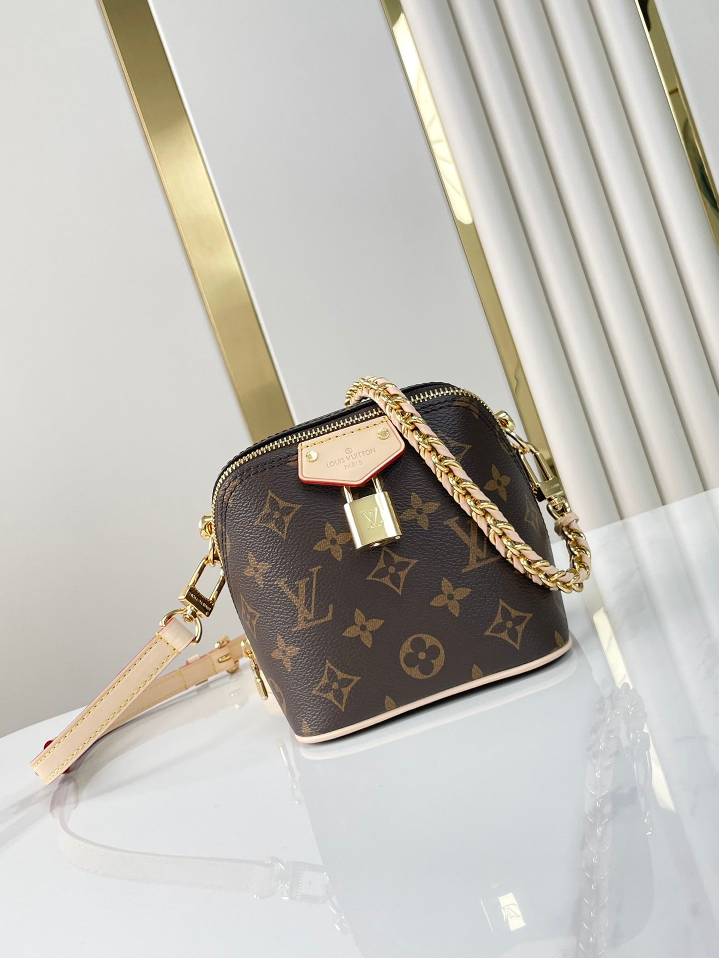 LOUIS VUITTON JUST IN CASE 14 IN BROWN MONOGRAM CANVAS GOLD HARDWARE
