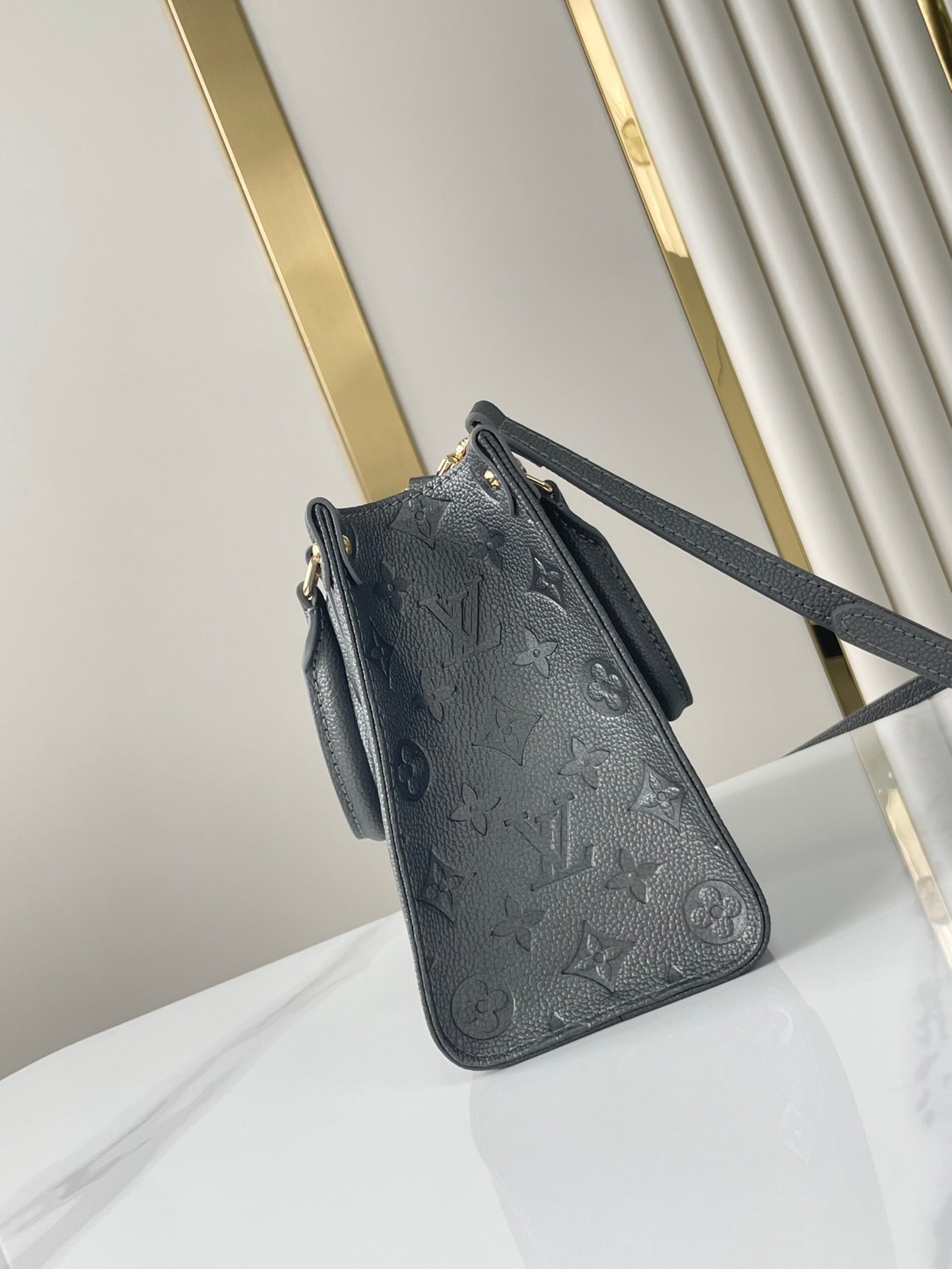 LOUIS VUITTON ONTHEGO PM 25 IN GUN METAL EMBOSSED CALFSKIN