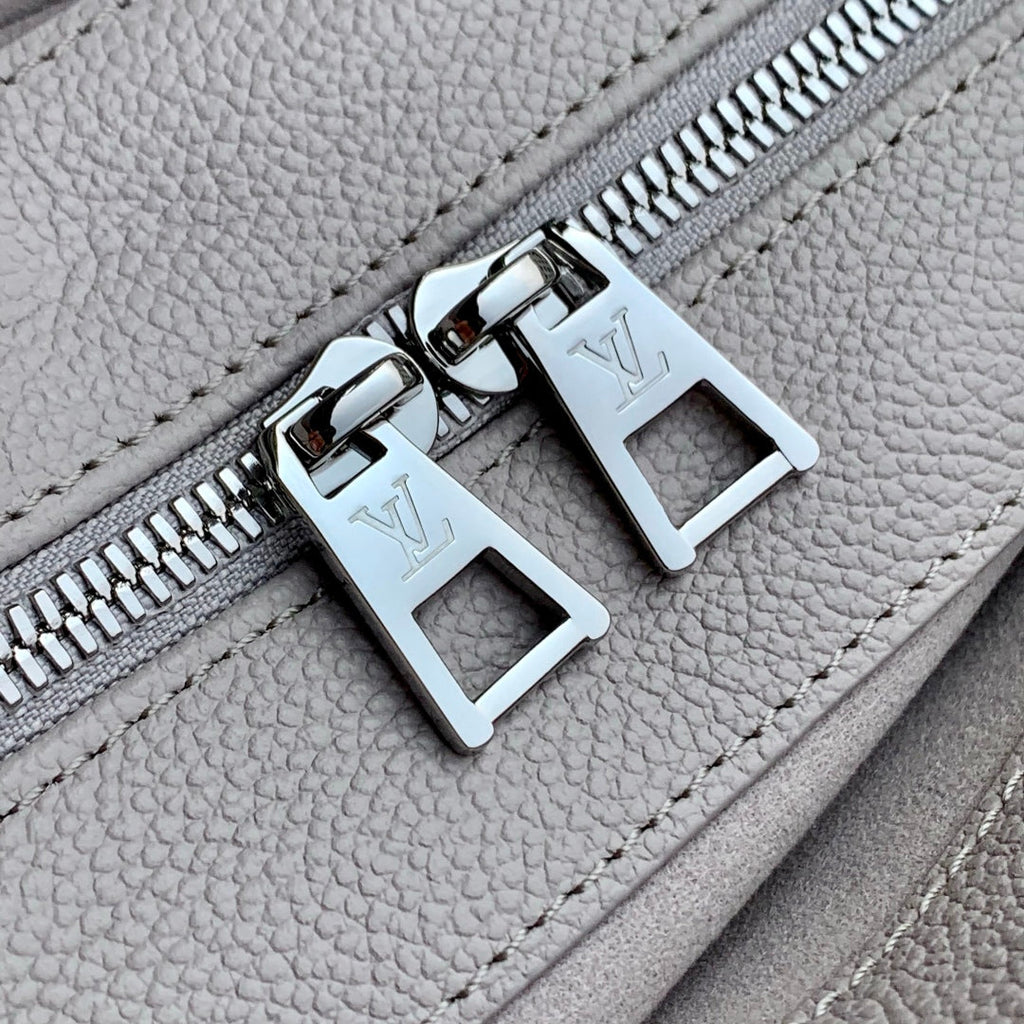 LOUIS VUITTON ONTHEGO EAST WEST BAG 25 IN BICOLOR MONOGRAM EMPREINTE LEATHER