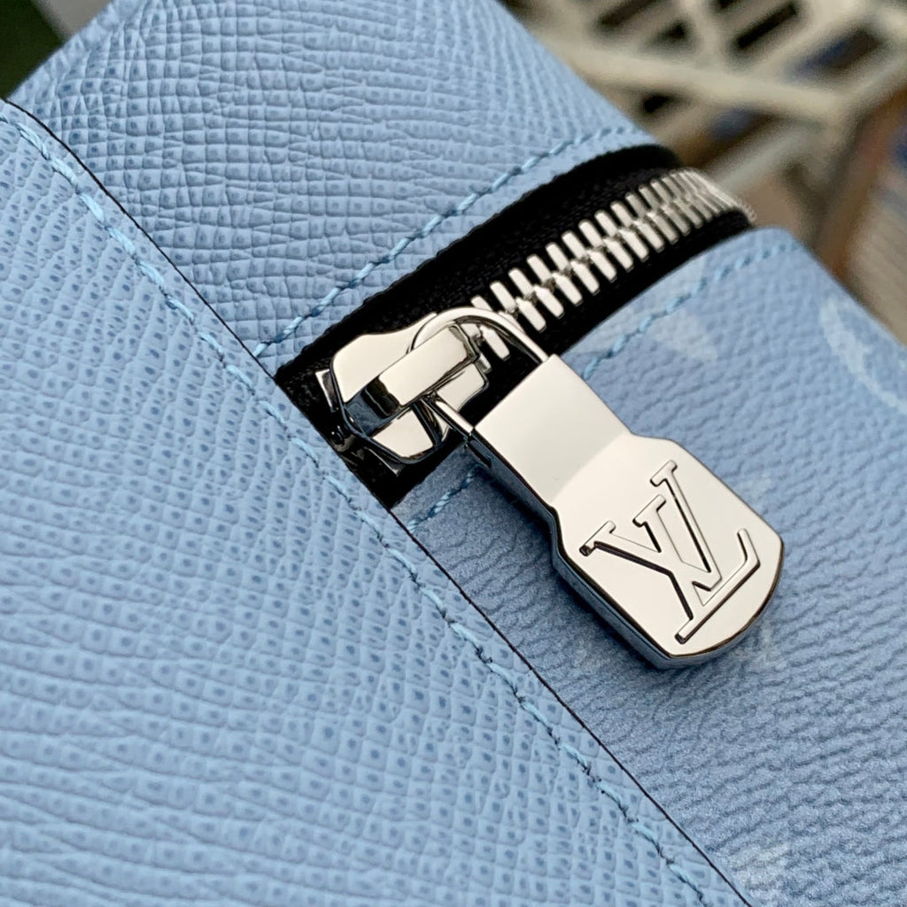 LOUIS VUITTON DISCOVERY SLIM BACKPACK 38 BLUE MONOGRAM COATED CANVAS AND CALFSKIN