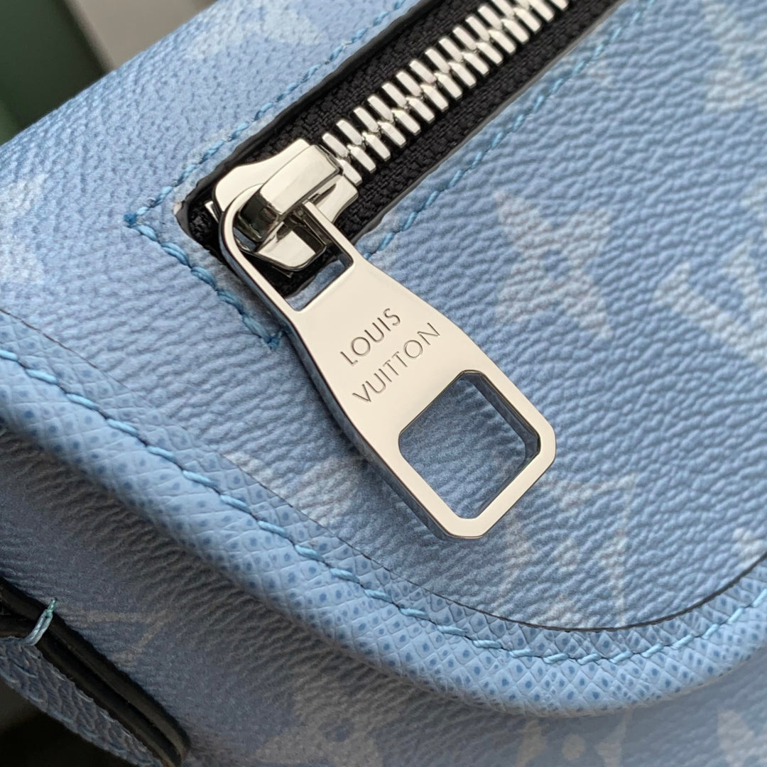 LOUIS VUITTON PULSE MESSENGER 22.5 IN BLUE MONOGRAM COATED CANVAS AND CALFSKIN