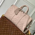 LOUIS VUITTON KEEPALL BANDOULIÈRE 34 BAG IN LIGHT BROWN MONOGRAM TAURILLON CALFSKIN