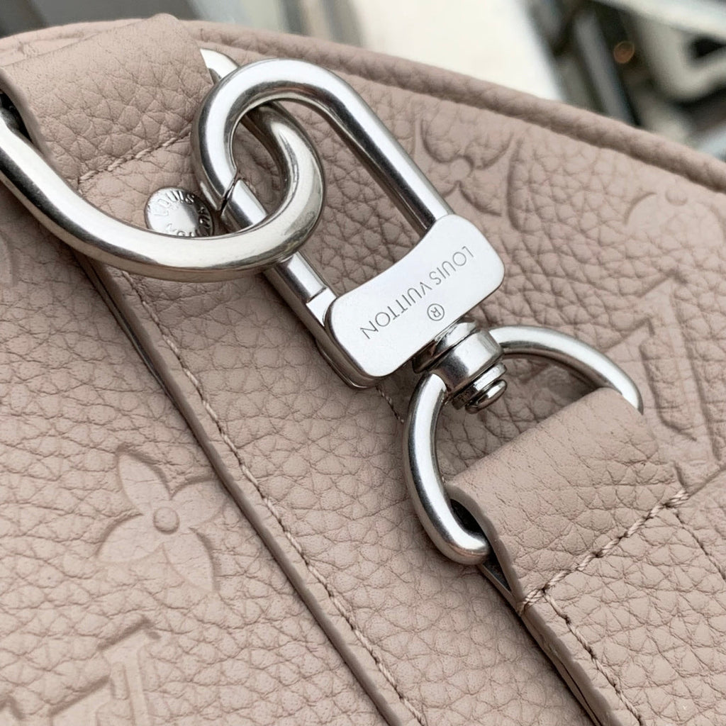 LOUIS VUITTON KEEPALL BANDOULIÈRE 34 BAG IN LIGHT BROWN MONOGRAM TAURILLON CALFSKIN