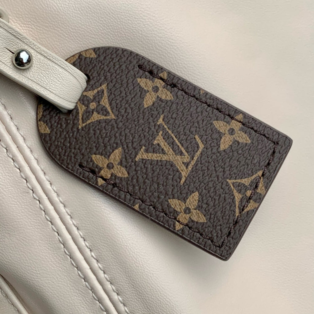 LOUIS VUITTON CARRYALL CARGO VIBE PM 33.5 IN VANILLE LAMBSKIN BORWN MONOGRAM TAG