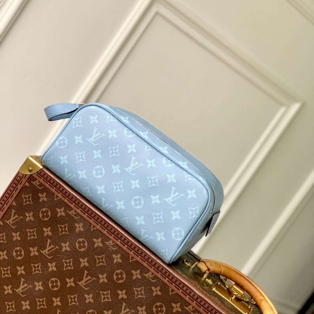 LOUIS VUITTON DOPP KIT 28 IN BLUE MONOGRAM COATED CANVAS