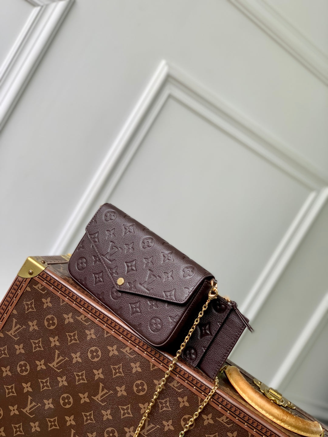 LOUIS VUITTON FÉLICIE POCHETTE 21 IN DARK BROWN MONOGRAM EMBOSSED LOGO CALFSKIN