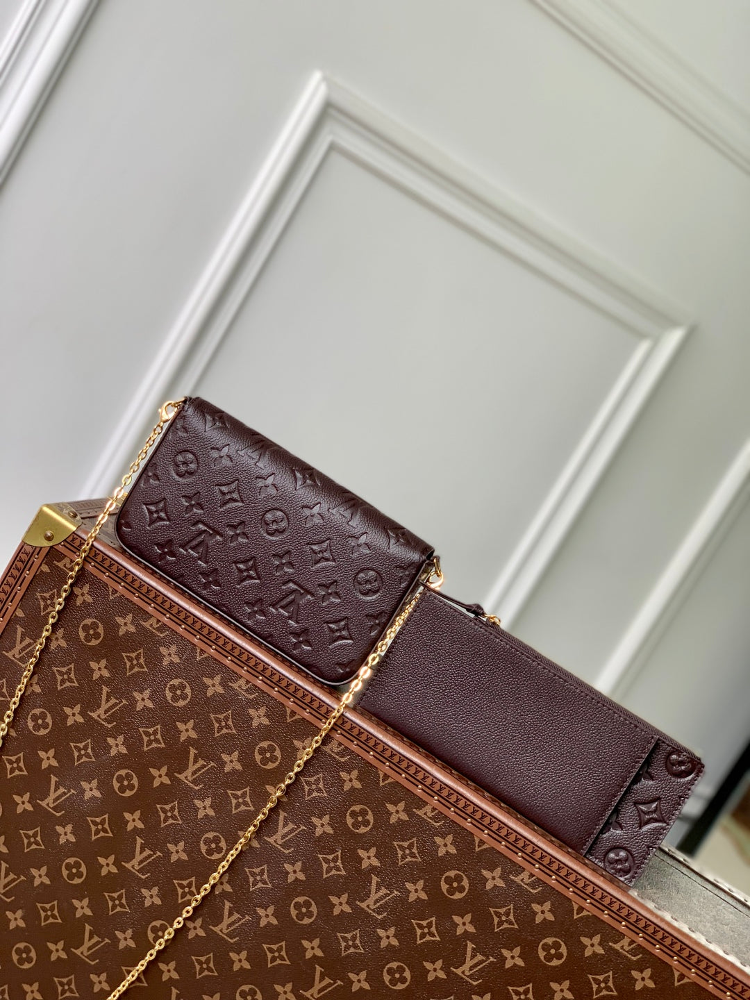 LOUIS VUITTON FÉLICIE POCHETTE 21 IN DARK BROWN MONOGRAM EMBOSSED LOGO CALFSKIN