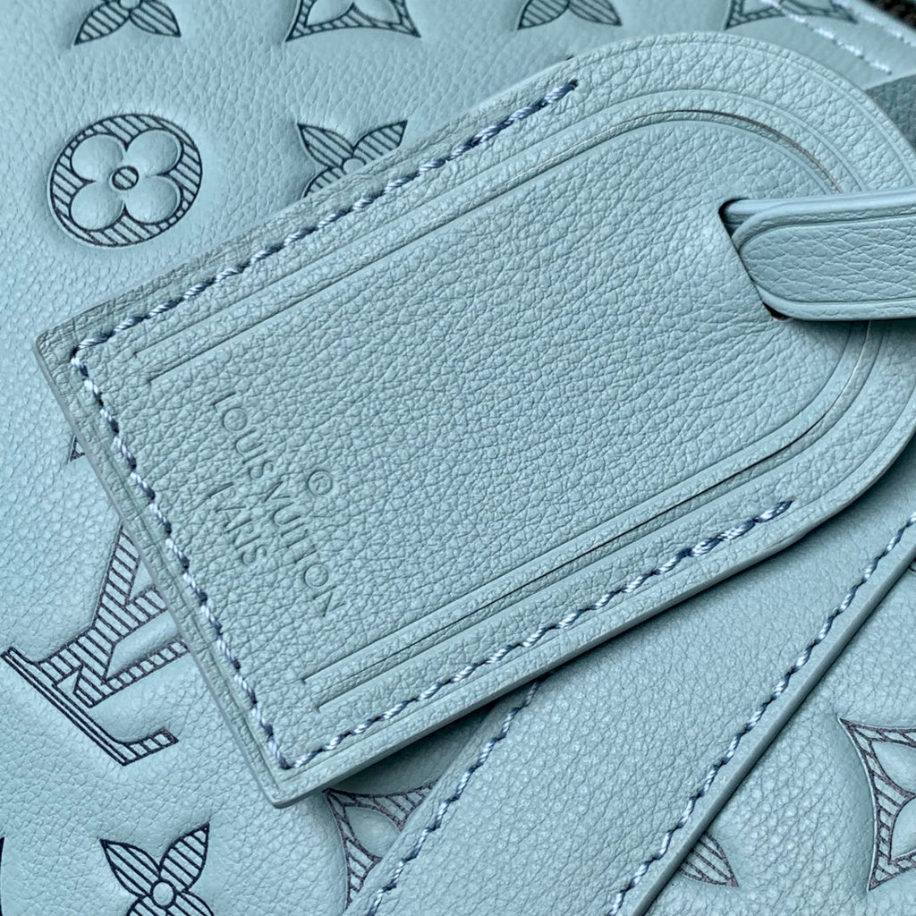 LOUIS VUITTON KEEPALL BANDOULIÈRE 50 IN SKY BLUE MONOGRAM SHADOW EMBOSSED CALFSKIN