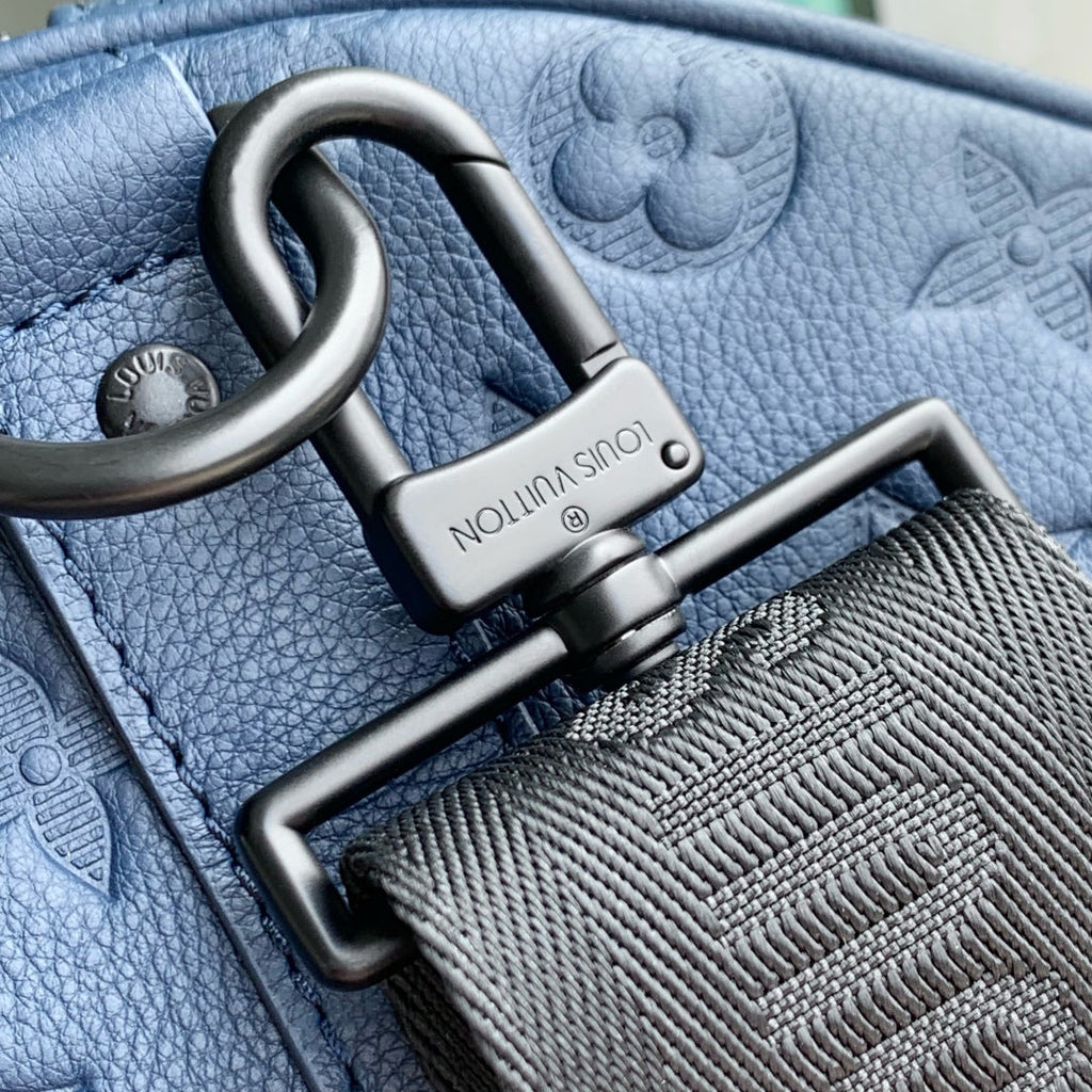 LOUIS VUITTON KEEPALL BANDOULIÈRE 50 IN DARK BLUE MONOGRAM SHADOW EMBOSSED CALFSKIN