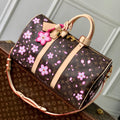 LOUIS VUITTON KEEPALL BANDOULIÈRE CHERRY BLOSSOM 45 IN SAKURA BROWN MONOGRAM COATED CANVAS