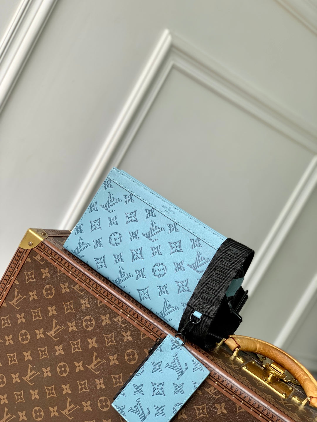 LOUIS VUITTON GASTON WEARABLE WALLET 22 IN SKY BLUE MONOGRAM SHADOW CALFSKIN EMBOSSED LOGO