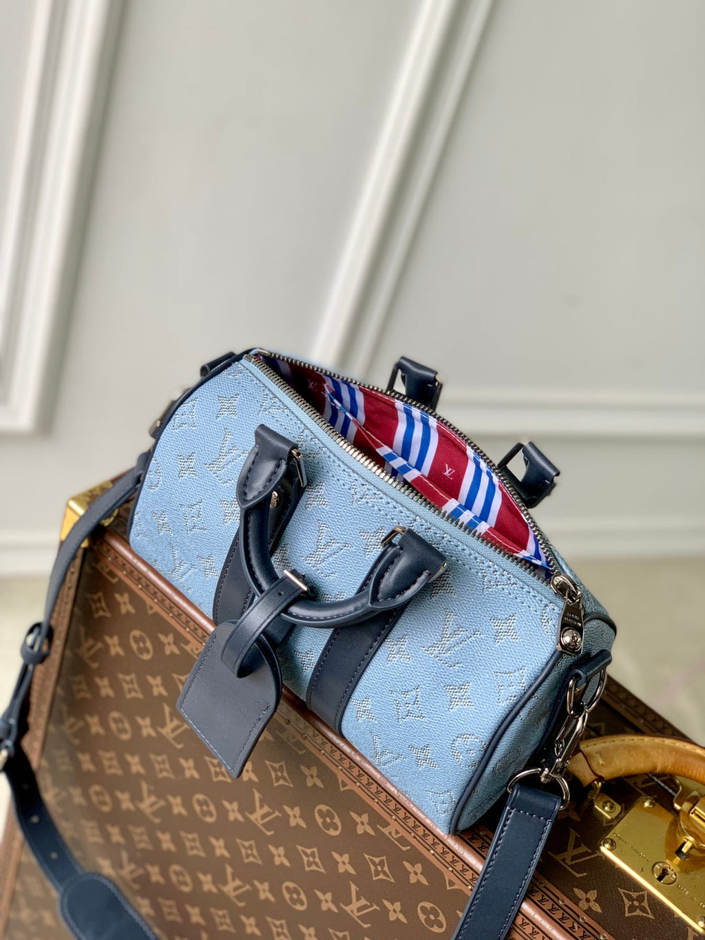 LOUIS VUITTON KEEPALL BANDOULIÈRE 25 INSKY BLUE MONOGRAM HERITAGE CANVAS DARK BLUE CALFSKIN
