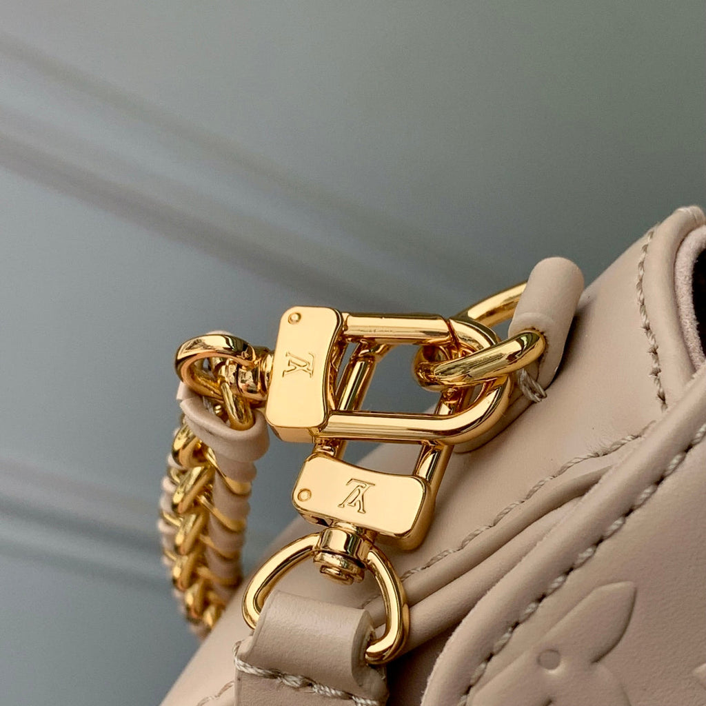 LOUIS VUITTON WALLET ON CHAIN IVY 23 IN BEIGE MONOGRAM REVERSE CANVAS EMBOSSED LOGO