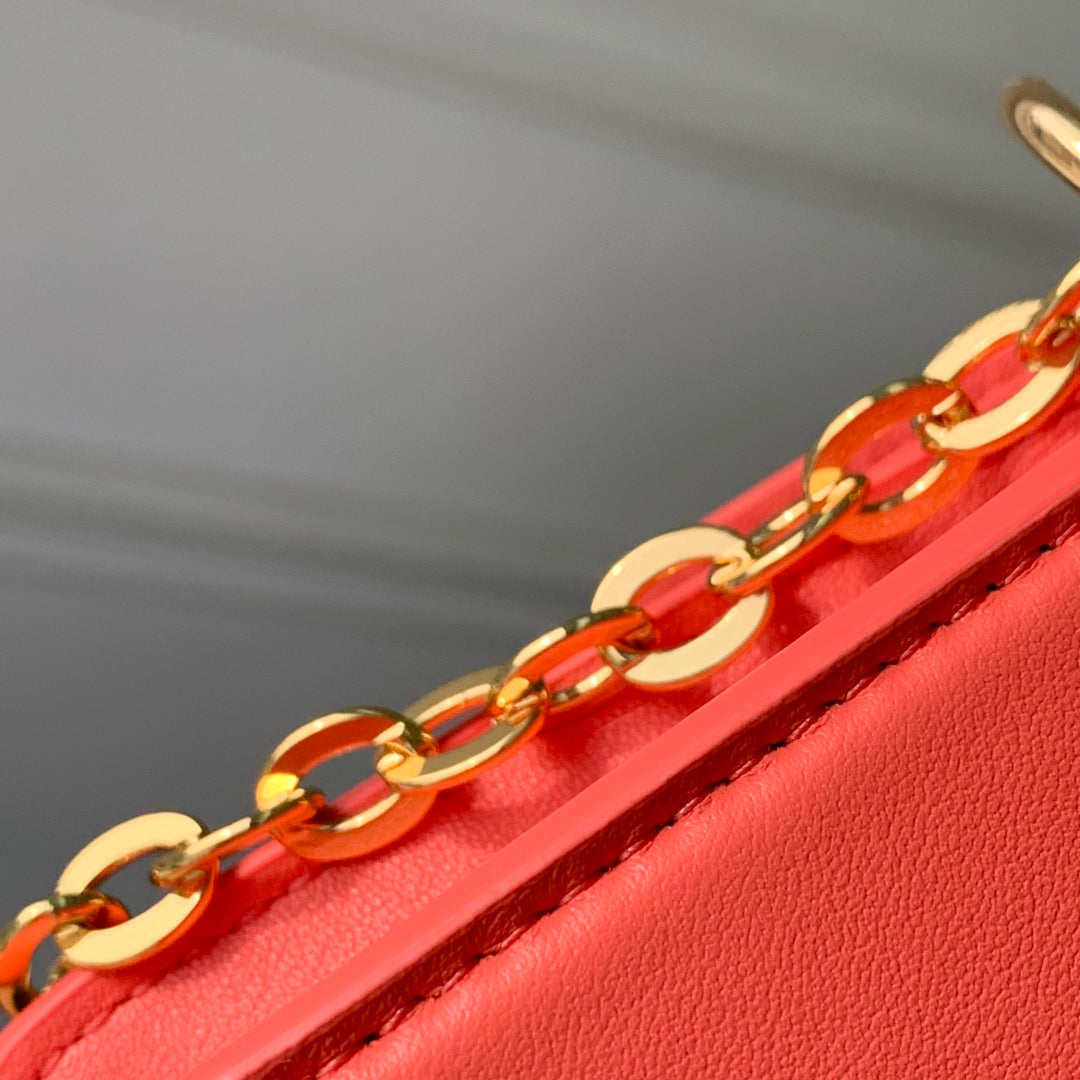 LOUIS VUITTON WALLET ON CHAIN BLOOM 20 IN SWEET CORAL CALFSKIN
