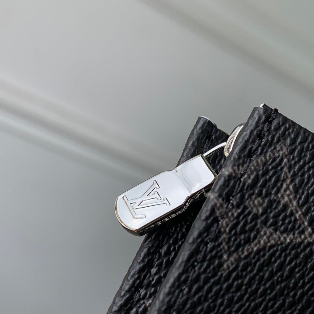 LOUIS VUITTON RIO TOILET POUCH 25 IN BLACK CANVAS MONOGRAM SILVER LOCK