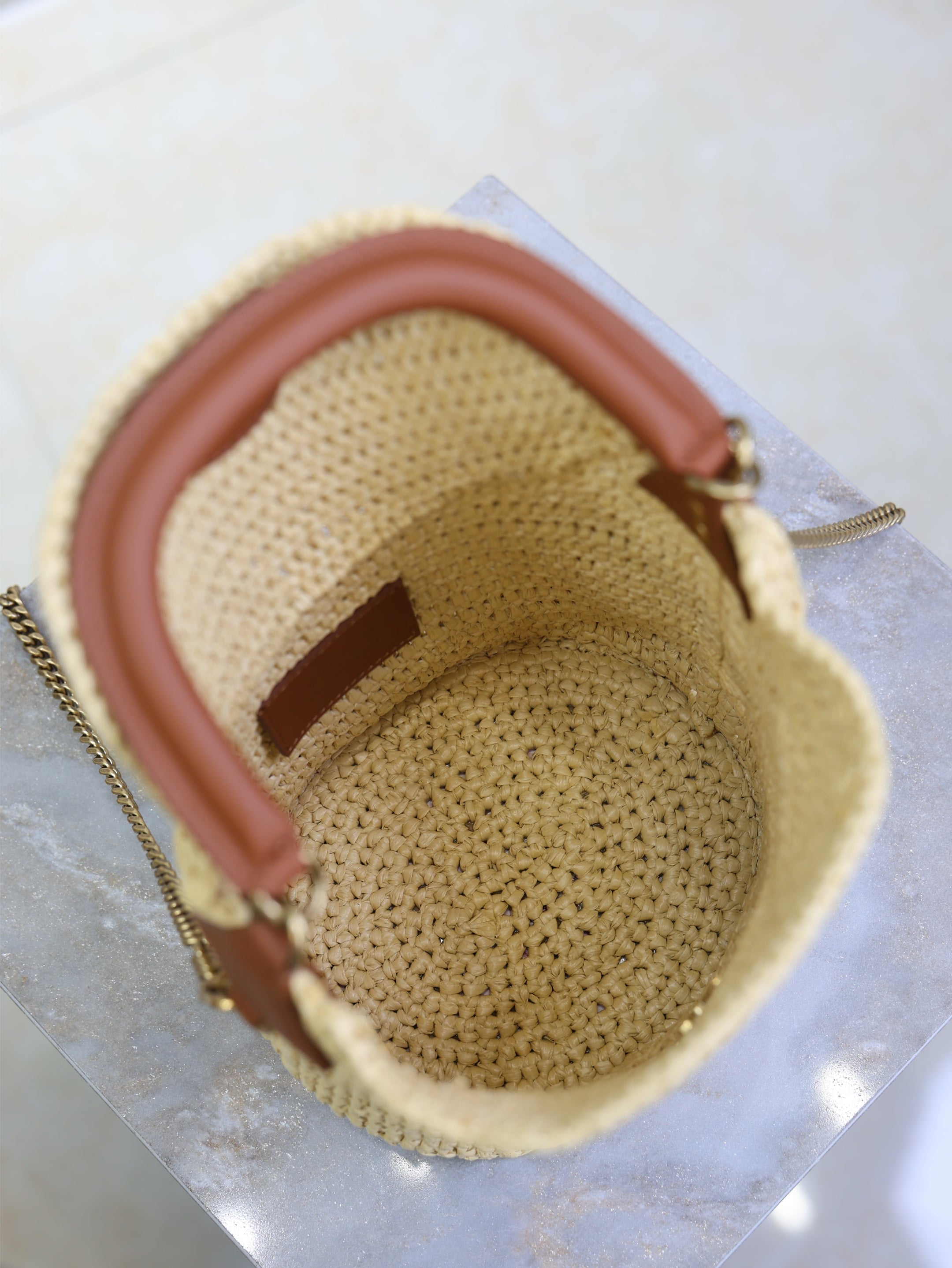 YSL 25S GABY BUCKET BAG 19 IN RAFFIA AND CALFSKIN GOLD HARDWRE