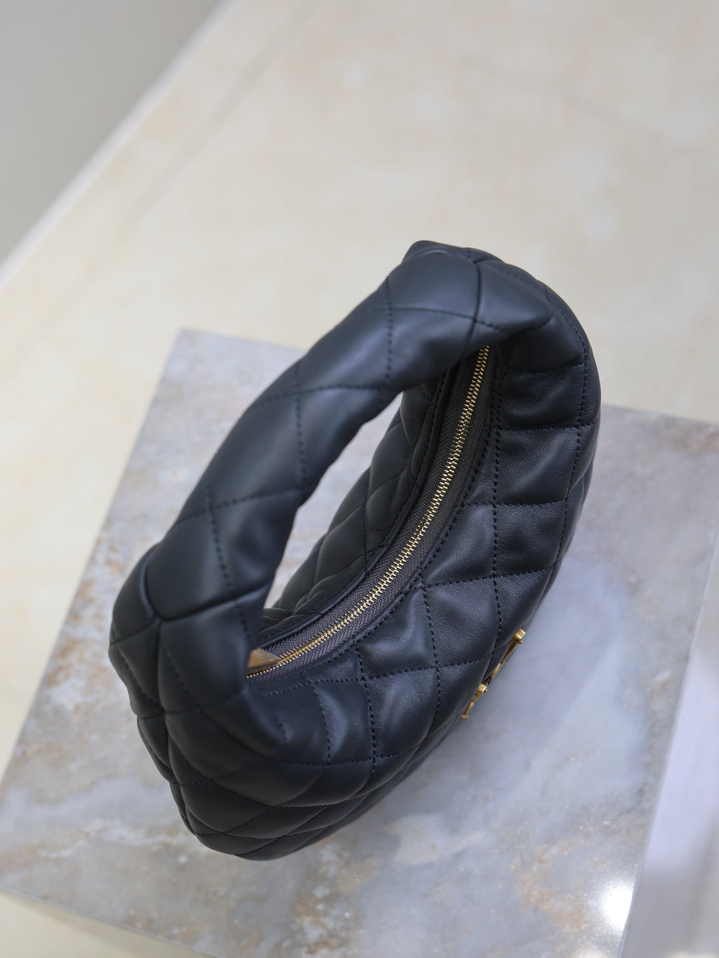 YSL 25S ICARINO 17 IN BLACK QUILTED CALFSKIN GOLD HARDWARE