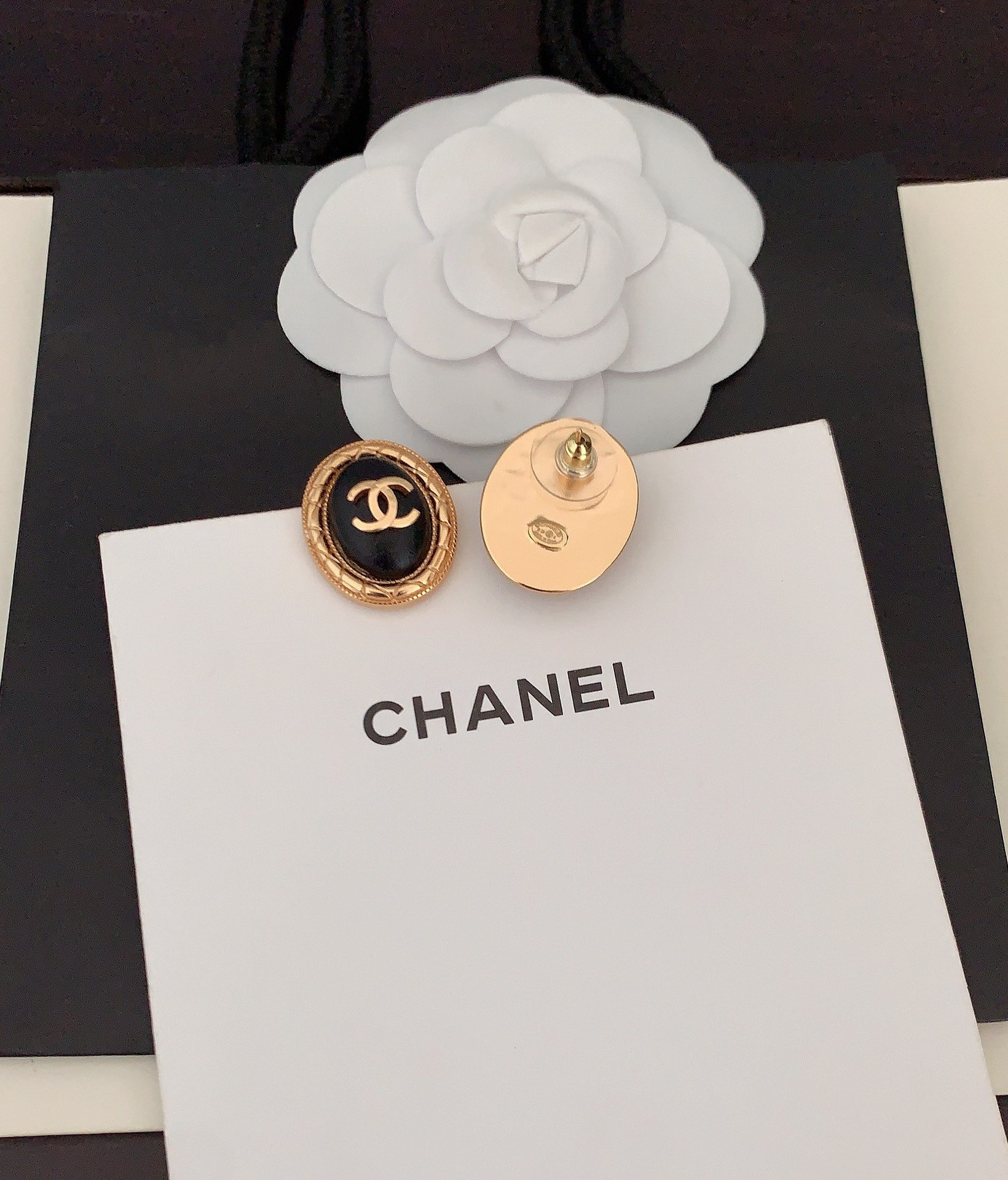 18K  Chanel Oval Leather Earrings