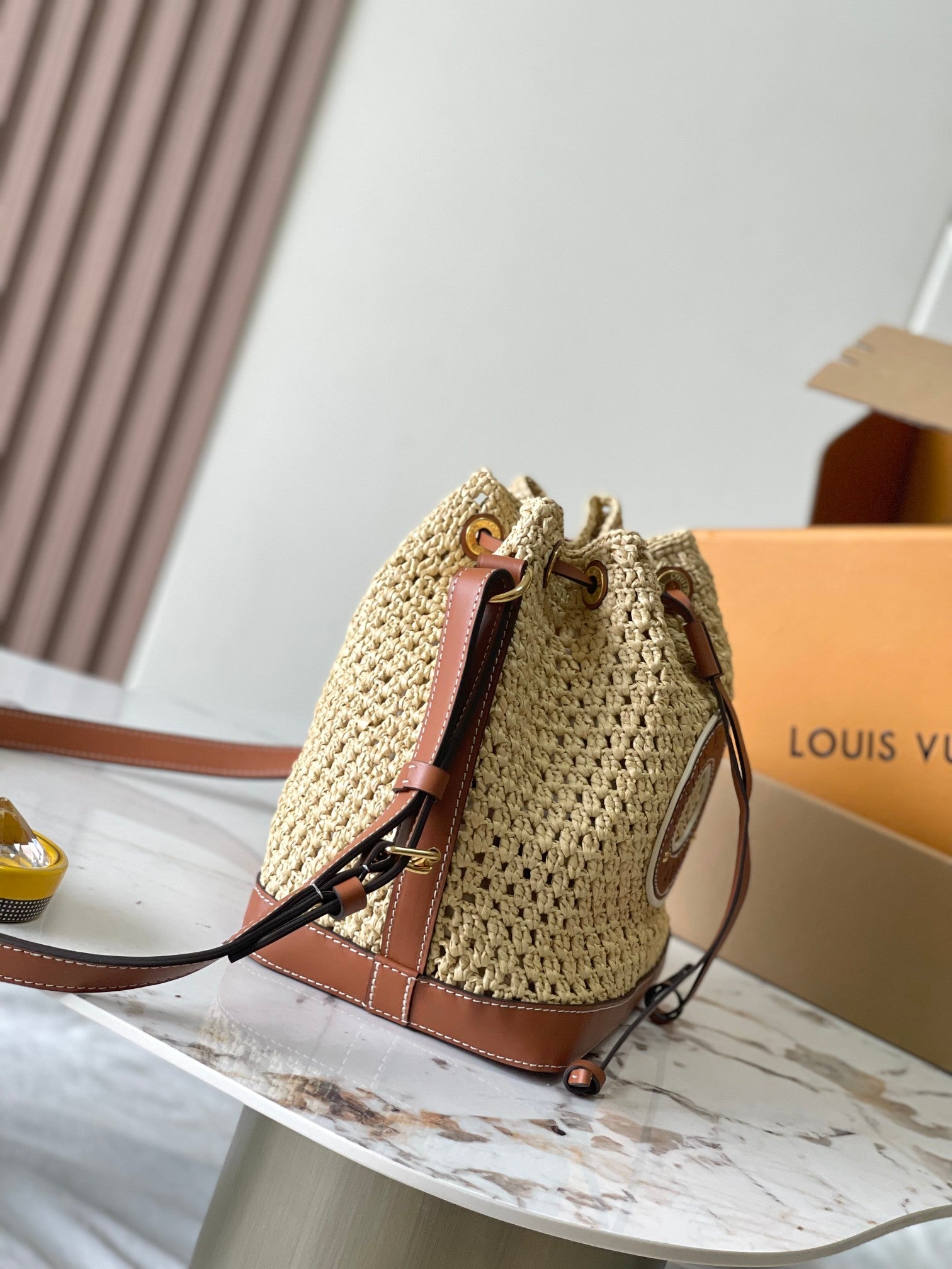 LOUIS VUITTON NOÉ PURSE 24 IN BEIGE CROCHETED RAFFIA AND BROWN CALFSKIN TRIM