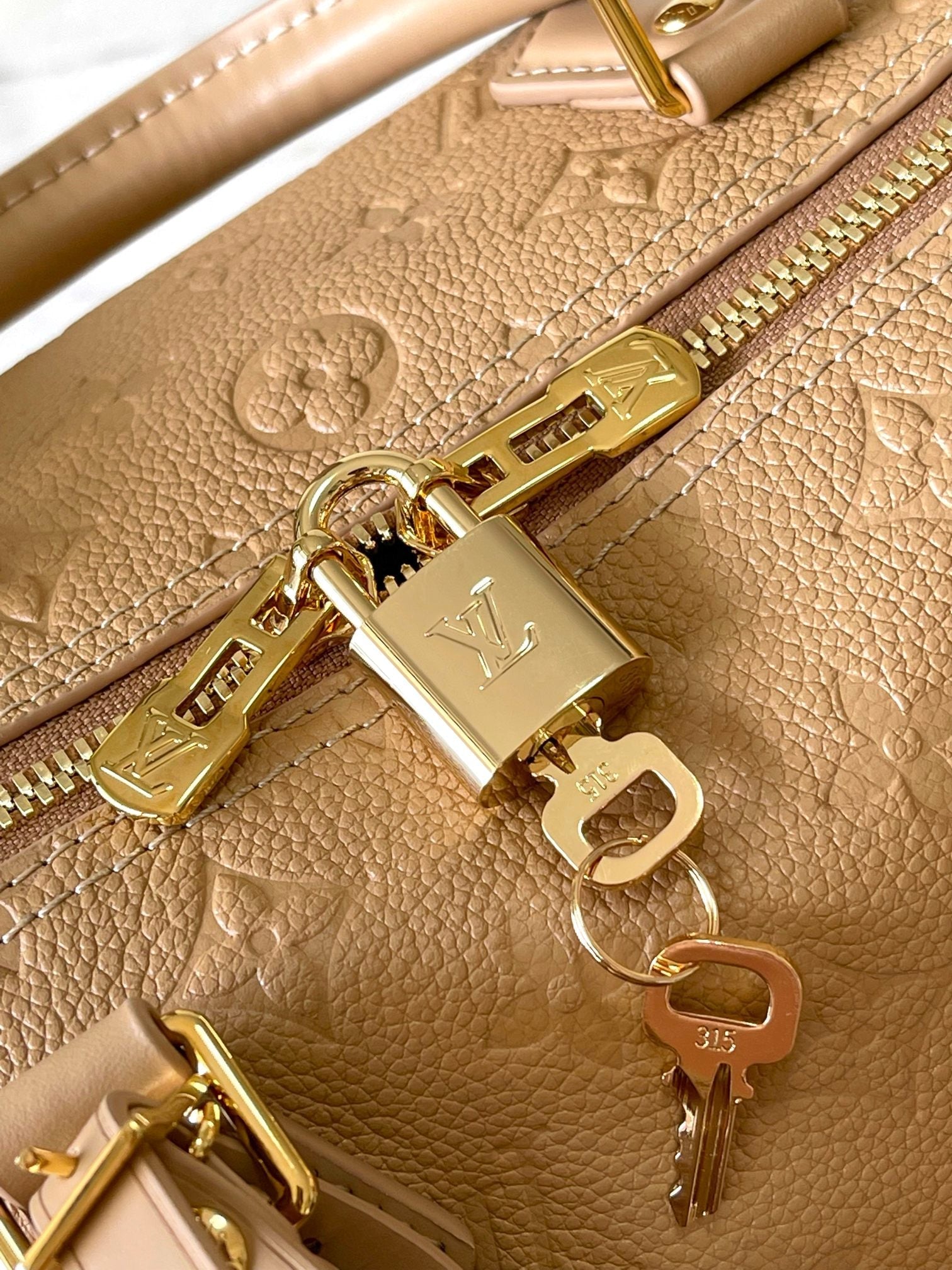 LOUIS VUITTON SPEEDY SOFT 30 IN PALE ORANGE EMBOSSED CALFSKIN