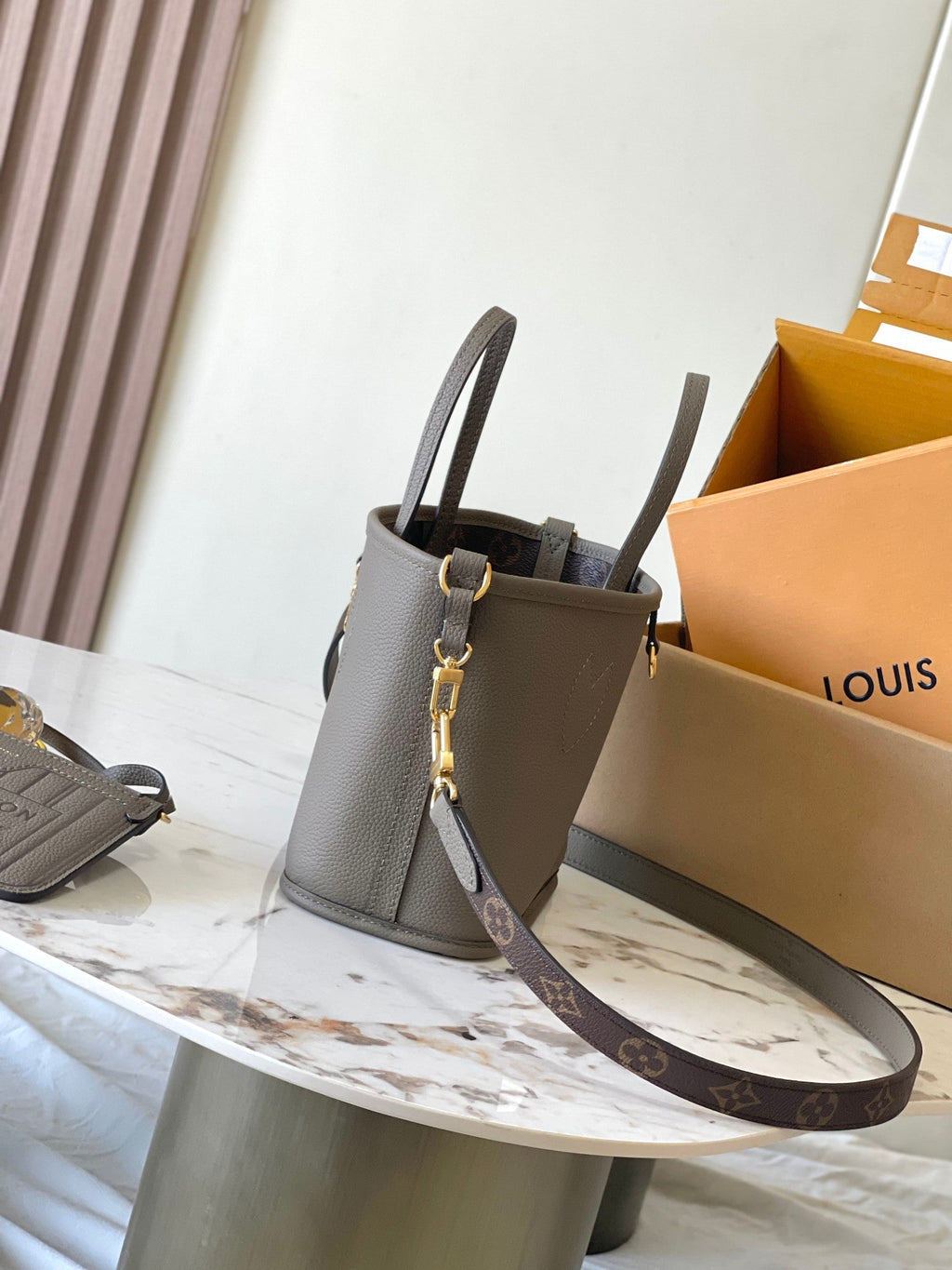 LOUIS VUITTON NEVERFULL BANDOULIÈRE INSIDE OUT BB 24 IN BROWN MONOGRAM CANVAS AND GRAY CALFSKIN