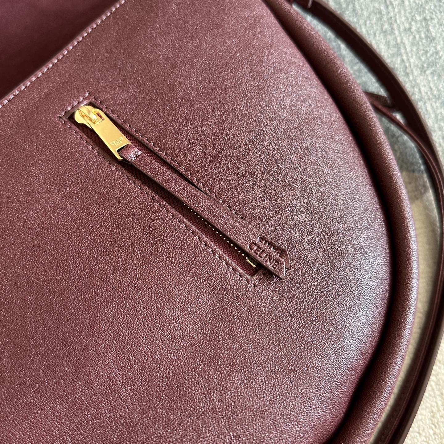 CELINE 25S HALFMOON SOFT TRIOMPHE BAG 46MM IN SYRAH RED SUPPLE SHINY LAMBSKIN
