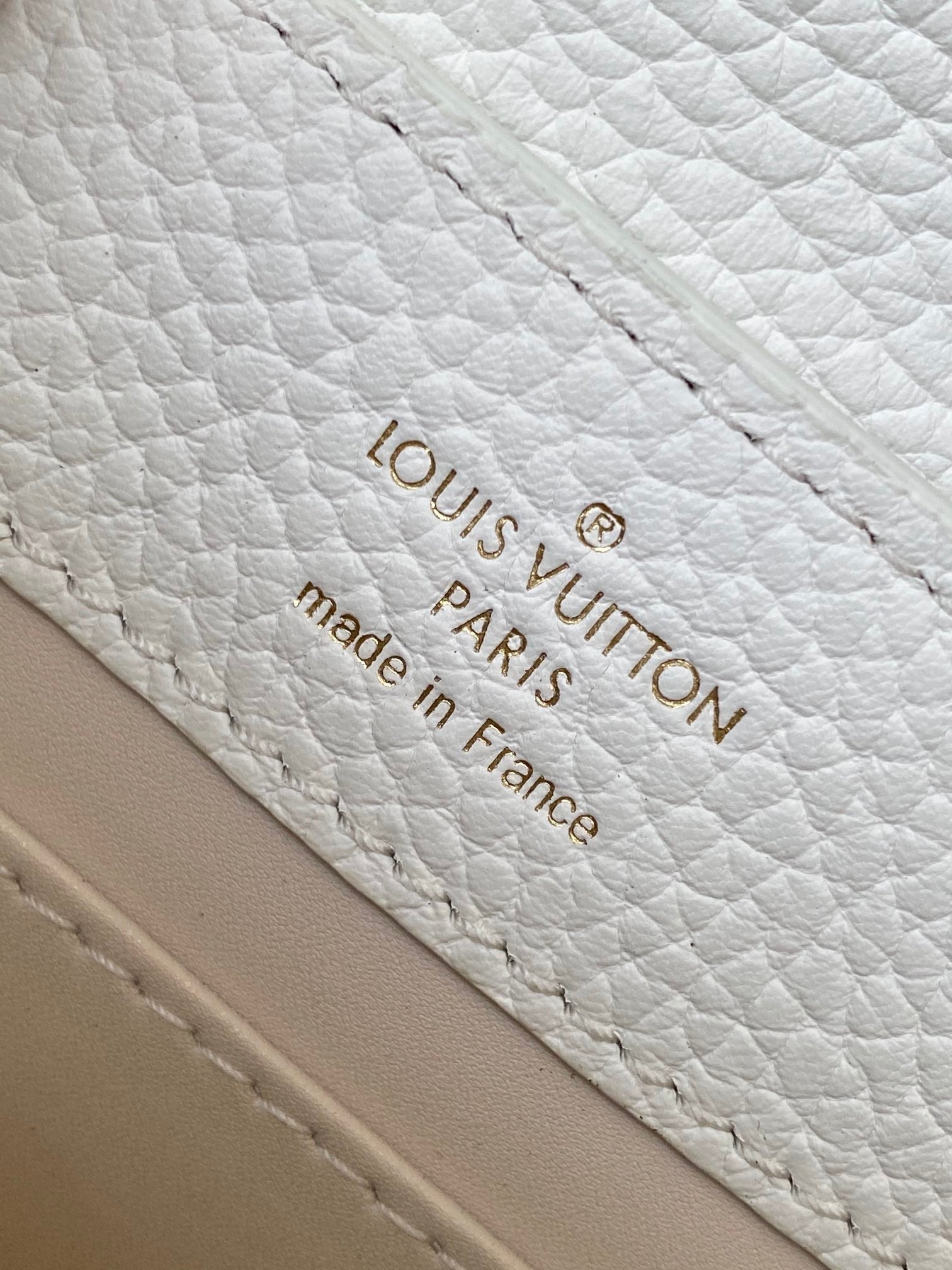 LOUIS VUITTON CAPUCINES EAST-WEST MINI 21 IN WHITE TAURILLON LEATHER GOLD-TONE HARDWARE