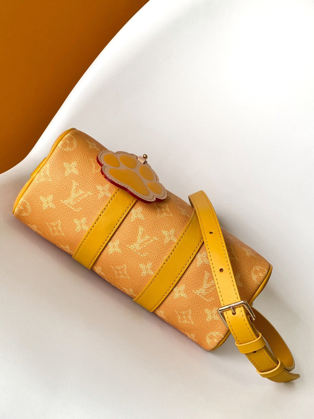 LOUIS VUITTON KEEPALL BANDOULIÈRE 25 IN ORANGE MONOGRAM HERITAGE CANVAS