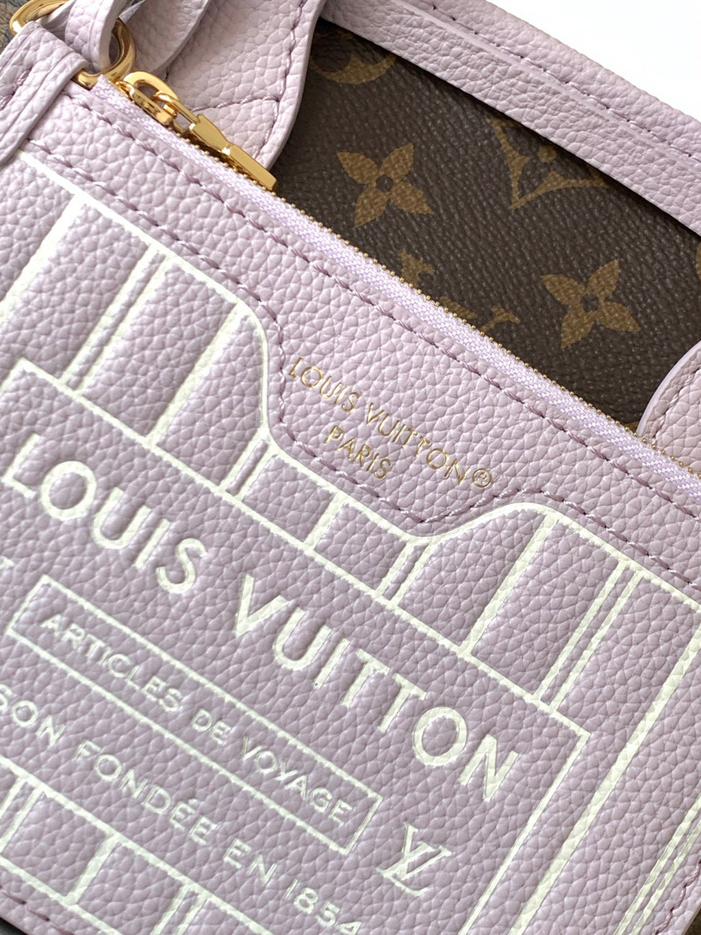 LOUIS VUITTON LV 25S NEVERFULL BANDOULIÈRE INSIDE OUT BB 31 IN LIGHT PURPLE AND BROWN CALFSKIN