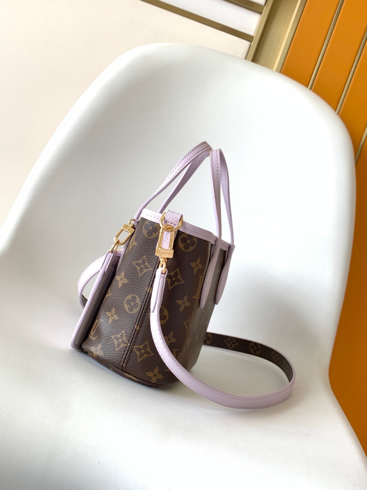 LOUIS VUITTON LV 25S NEVERFULL BANDOULIÈRE INSIDE OUT BB 24 IN LIGHT PURPLE AND BROWN CALFSKIN