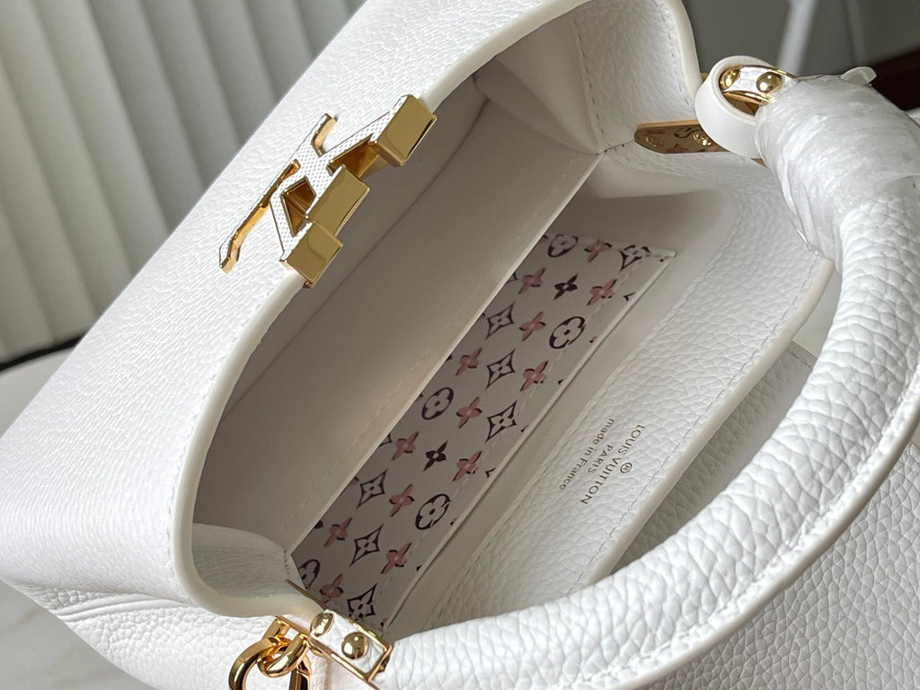 LOUIS VUITTON CAPUCINES MINI 21 IN WHITE TAURILLON GOLD HARDWARE