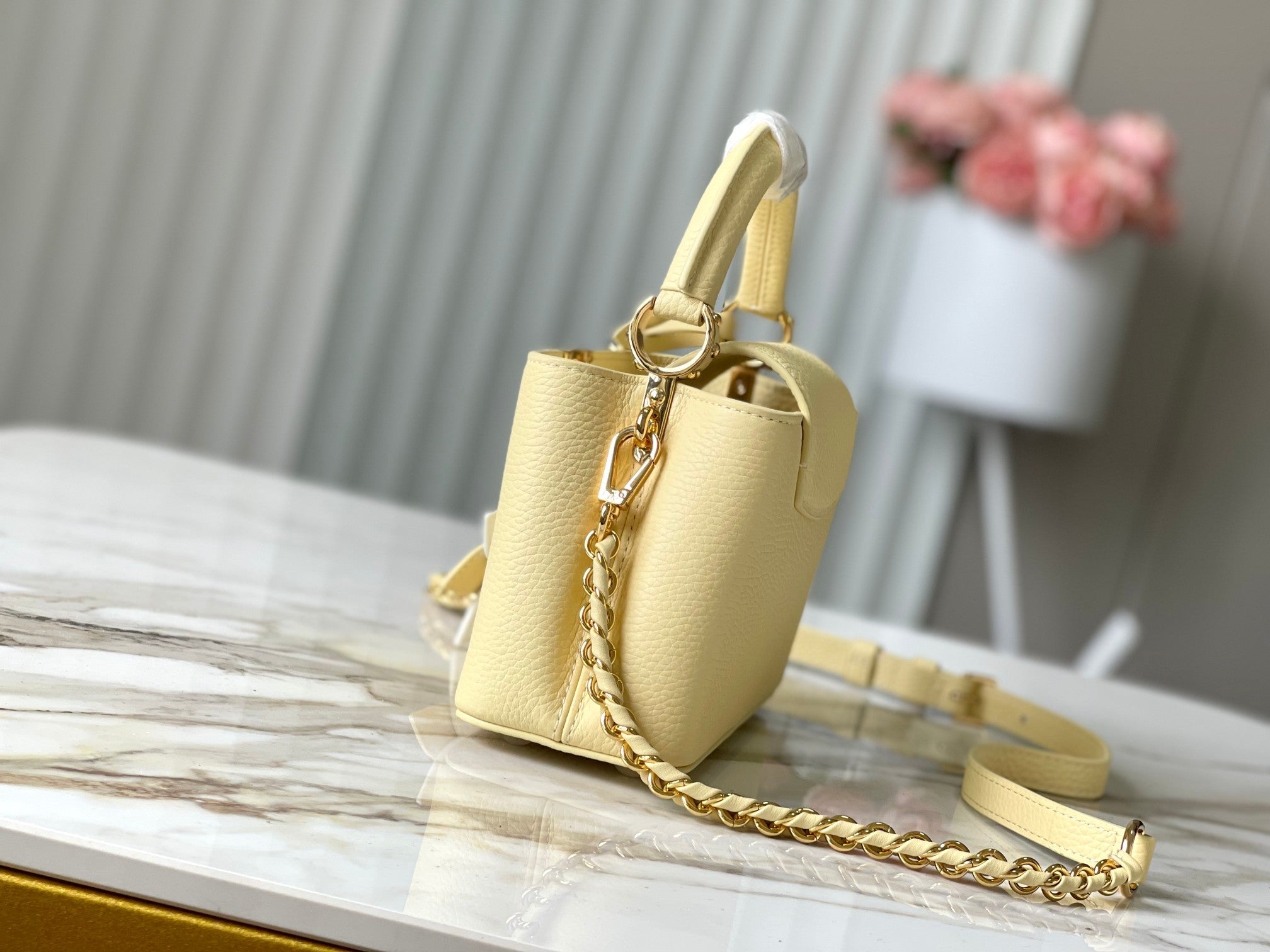 LOUIS VUITTON CAPUCINES EAST-WEST MINI 22 IN BANANA YELLOW TAURILLON GOLD HARDWARE