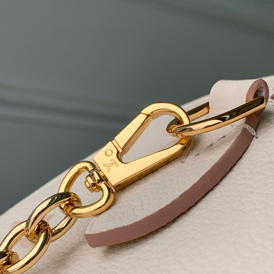 LOUIS VUITTON SPEEDY BANDOULIÈRE 20.5 IN LIGHT PINK MONOGRAM EMPREINTE CANVAS