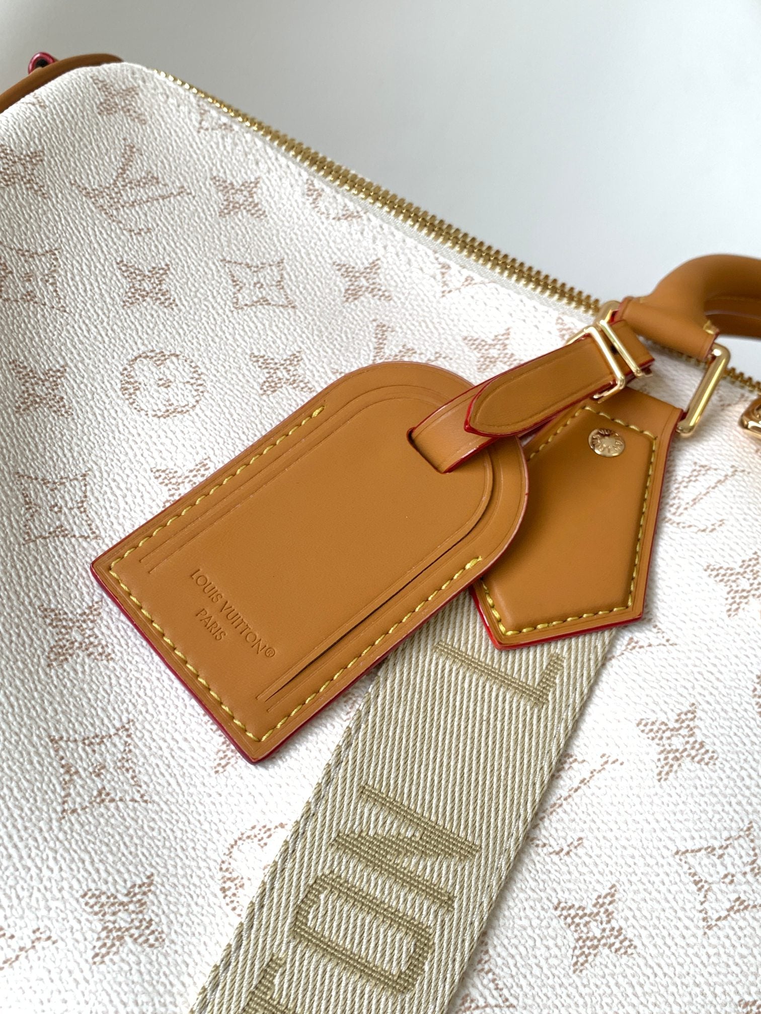 LOUIS VUITTON LV 25S KEEPALL BANDOULIÈRE BAG 45 IN WHITE MONOGRAM HERITAGE CALFSKIN