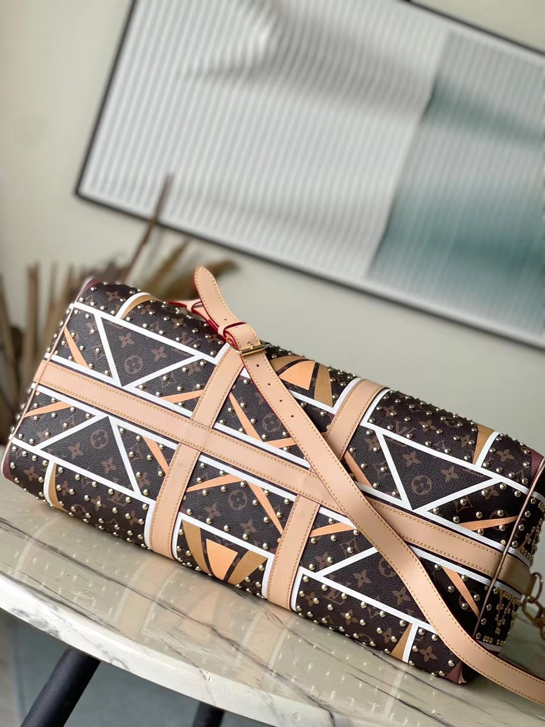 LOUIS VUITTON KEEPALL BANDOULIÈRE 50 IN PARFLECHE PATTERN MONOGRAM CANVAS