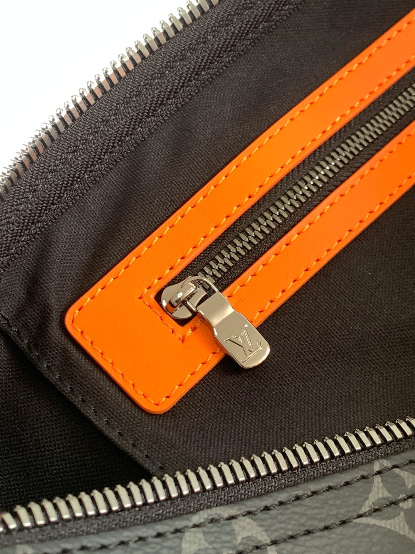 LOUIS VUITTON LV 25S KEEPALL 45 WITH SHOULDER STRAP IN BLACK ORANGE COATED MONOGRAM ECLIPSE CANVAS AND CALFSKIN