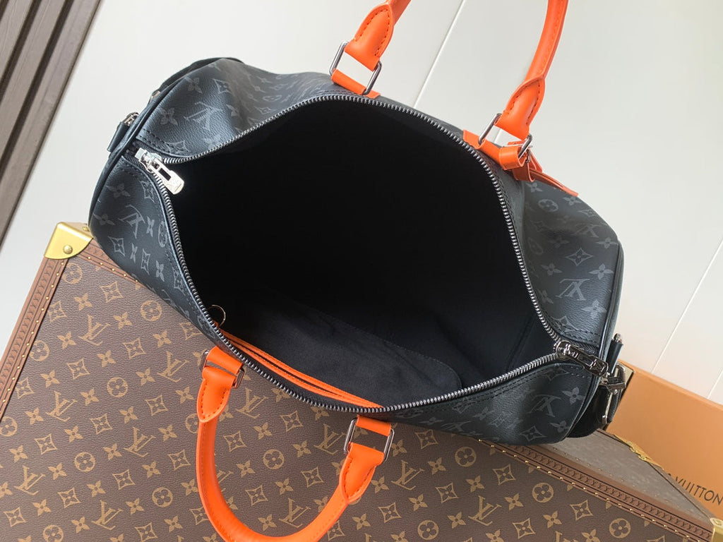 LOUIS VUITTON LV 25S KEEPALL 45 WITH SHOULDER STRAP IN BLACK ORANGE COATED MONOGRAM ECLIPSE CANVAS AND CALFSKIN