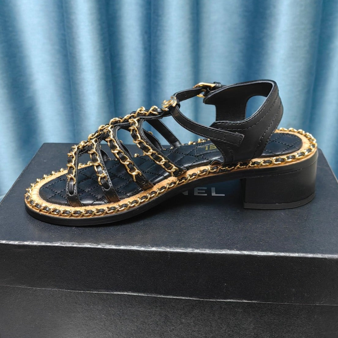 CHANEL HIGH SANDALS WITH THREE STRAPS IN BLACK CALFSKIN