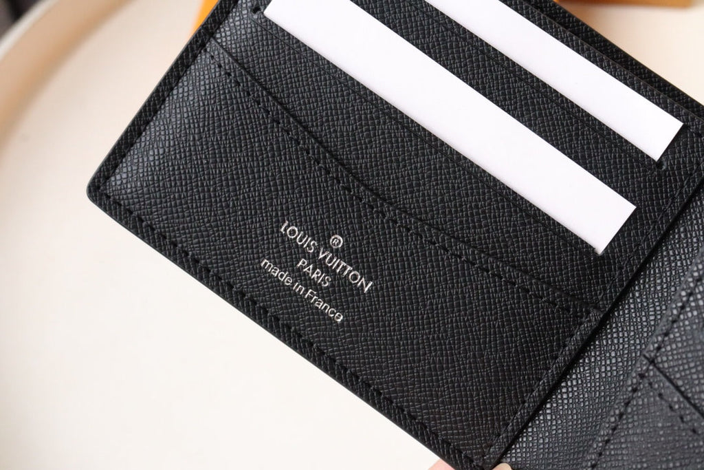 LOUIS VUITTON LV 25S SLENDER WALLET 11 IN BLACK TAIGA CALFSKIN