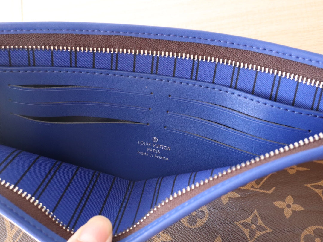 LOUIS VUITTON LV 25S POCHETTE VOYAGE 26 IN INDIGO BLUE MONOGRAM MACASSAR COATED CANVAS