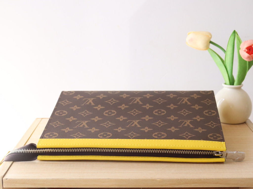 LOUIS VUITTON LV 25S POCHETTE VOYAGE 26 IN YELLOW MONOGRAM MACASSAR COATED CANVAS