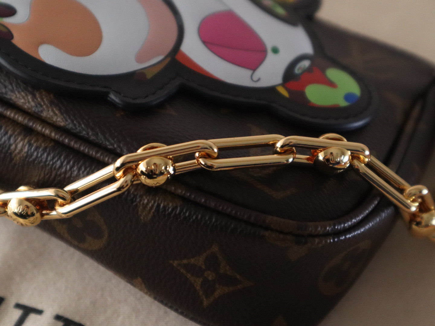 LOUIS VUITTON PANDA POCHETTE BAG 22 IN BROWN MONOGRAM COATED CANVAS