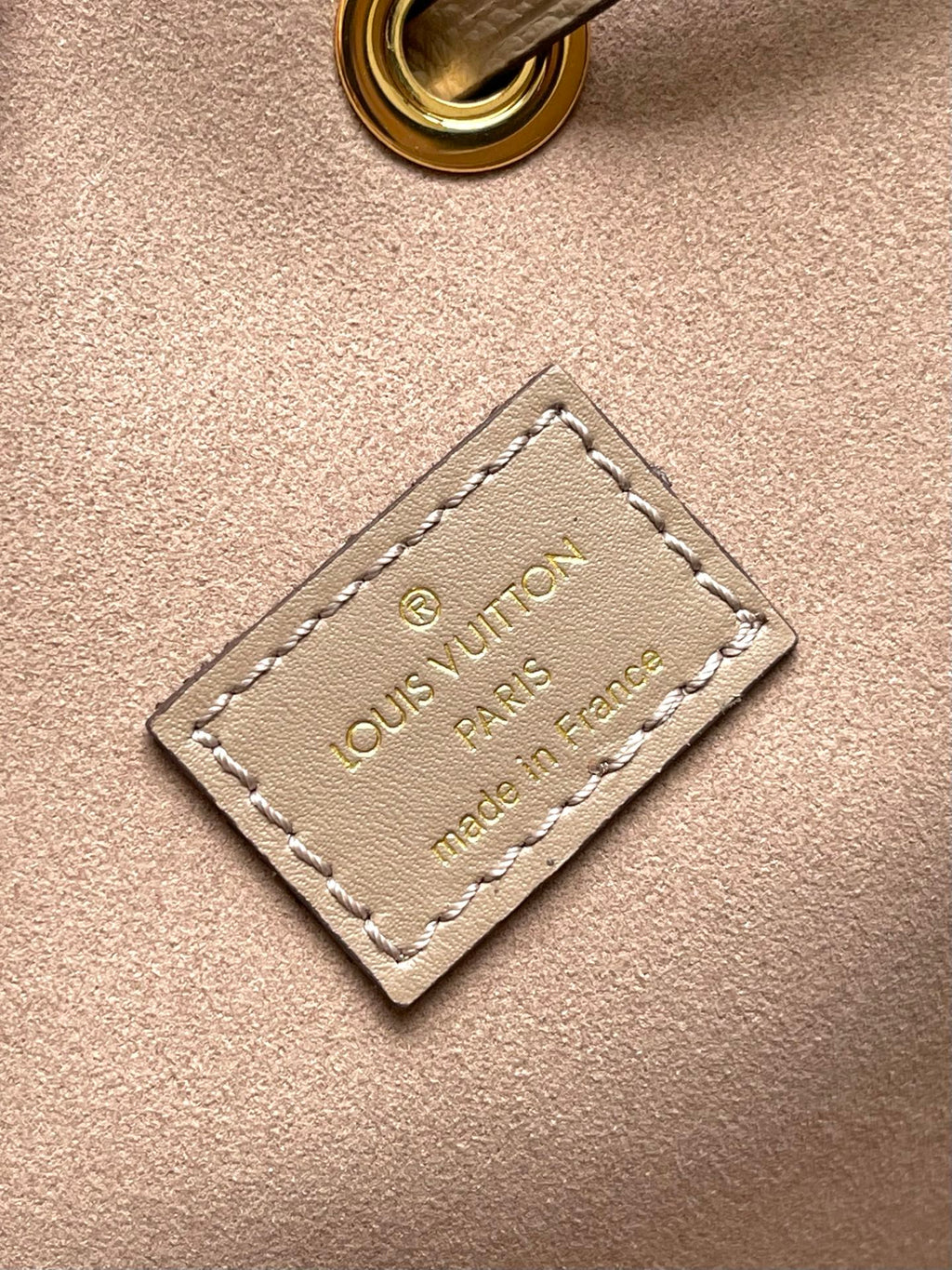 LOUIS VUITTON CRAFTY NEONOE 26 IN BROWN AND CREAM BICOLOR EMPREINTE CALFSKIN