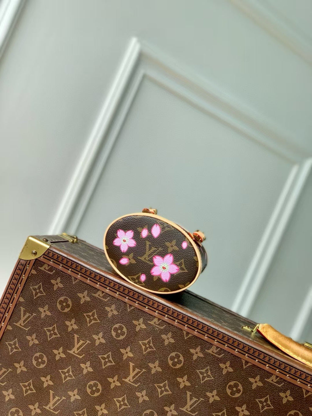 LOUIS VUITTON NANO BUCKET CHERRY BLOSSOM IN SAKURA BROWN MONOGRAM COATED CANVAS
