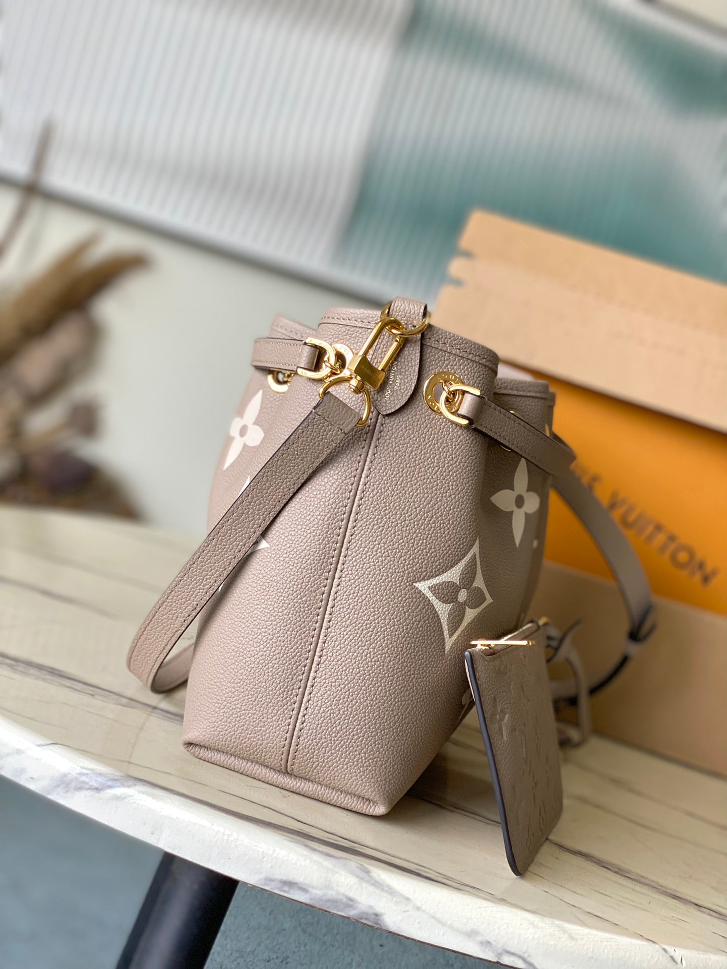 LOUIS VUITTON BUNDLE 28 IN TOURTERELLE WHITE MONOGRAM EMPREINTE LEATHER GOLD HARDWARE