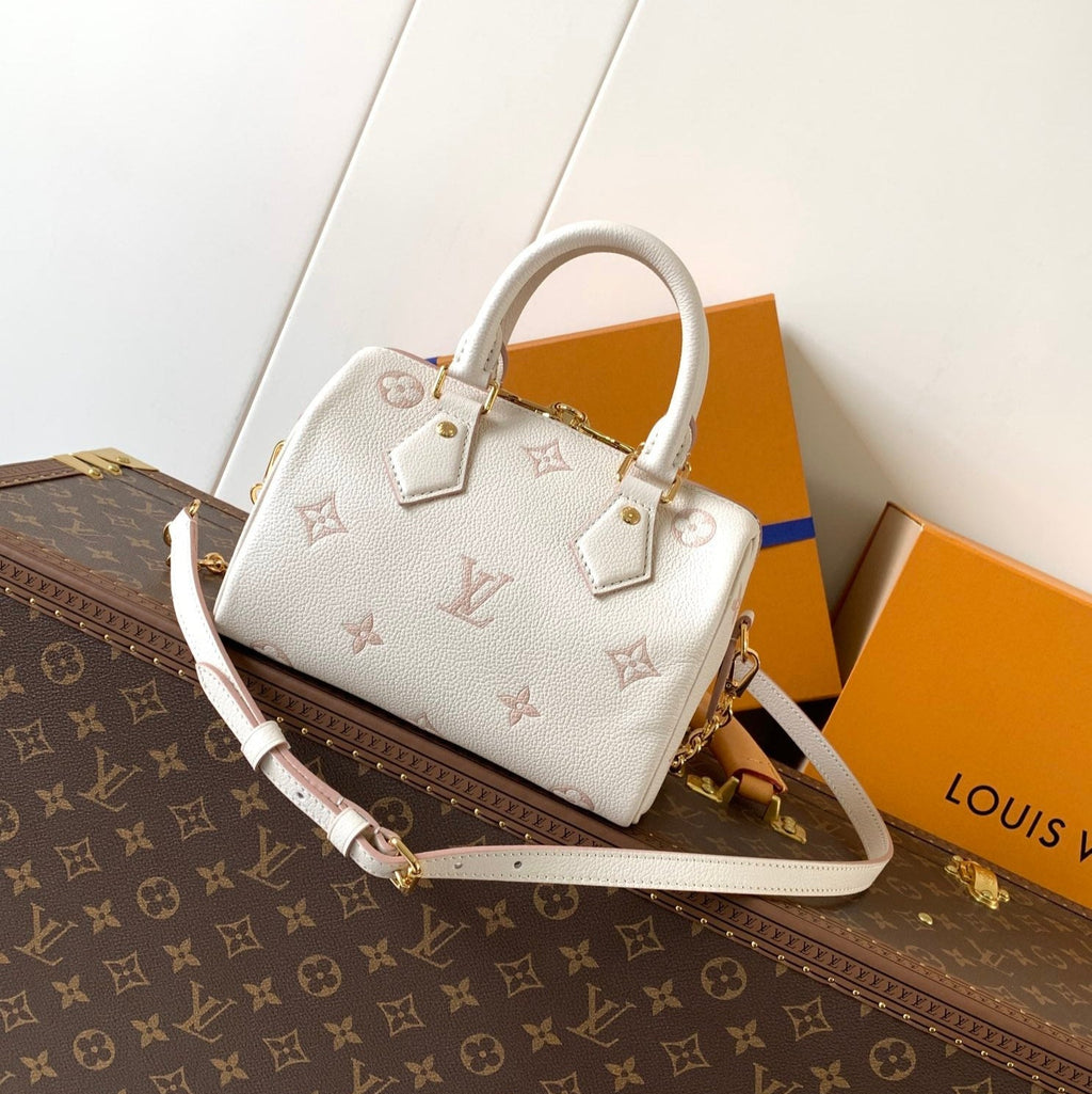 LOUIS VUITTON SPEEDY BANDOULIÈRE 21 IN WHITE AND PINK MONOGRAM CANVAS